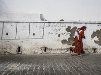 Mother with her baby in the streets of Tanger; Morocco. (