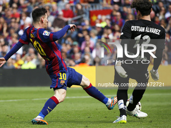 BARCELONA - march 08- SPAIN: Leo Messi and Cristian Alvarez in the match between FC Barcelona and Rayo Vallecano, for the week 26 of the spa...