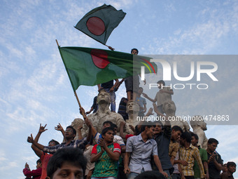 Dhaka Bangladesh 09th March, 2015: Bangladeshi cricket supporters celebrates the national team's win against England in the ICC World Cup 20...