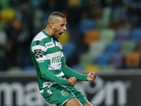 Sporting's forward Islam Slimani celebrates the goal scored by Sporting's midfielder Nani during the Portuguese League  football match betwe...