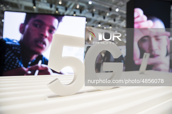 5G logo at the Samsung boot during the international electronics and innovation fair IFA in Berlin on September 11, 2019. 