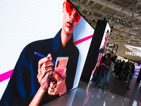 Visitors at the new Samsung 5G Fold smartphone boot during the international electronics and innovation fair IFA in Berlin on September 11,...