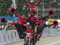 Malaysian Army team perform motorcycle acrobatic stunt performance during final stage of Le Tour de Langkawi cycling competition in Kuala Lu...