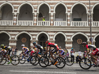 Cyclists ride pass old heritage building during final stage of Le Tour de Langkawi cycling competition in Kuala Lumpur, Malaysia on 15 March...