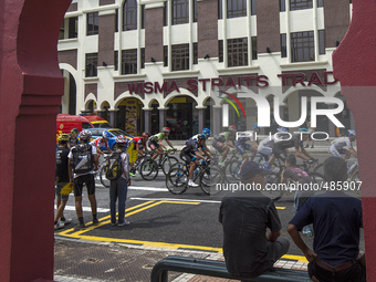 Cyclists compete during final stage of Le Tour de Langkawi cycling competition in Kuala Lumpur, Malaysia on 15 March 2015. Algerian rider Yo...
