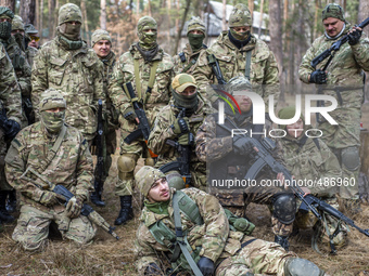 Group of volunteers and reserve soldiers listening a class at training center 'Patriot', Kyiv, Ukraine. 15 of March, 2015.  (Photo by Oleksa...