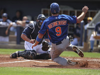 New York Mets right fielder Kirk Nieuwenhuis (9) is tagged out at home plate by Tampa Bay Rays catcher Bobby Wilson (60) during the second i...