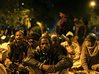 Indian farmers as they gather near the parliament for a protest against the land acquisition bill in New Delhi on March 18,2015.Thousands of...