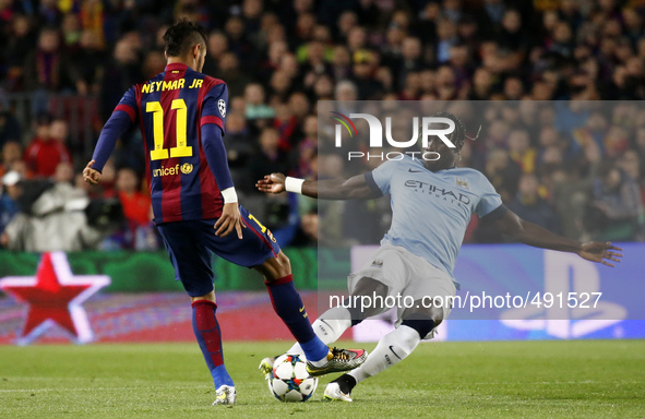BARCELONA, SPAIN - MARCH 18: Neymar Jr. and Sagna  during the UEFA Champions League round of 16 match between FC Barcelona and Manchester Ci...