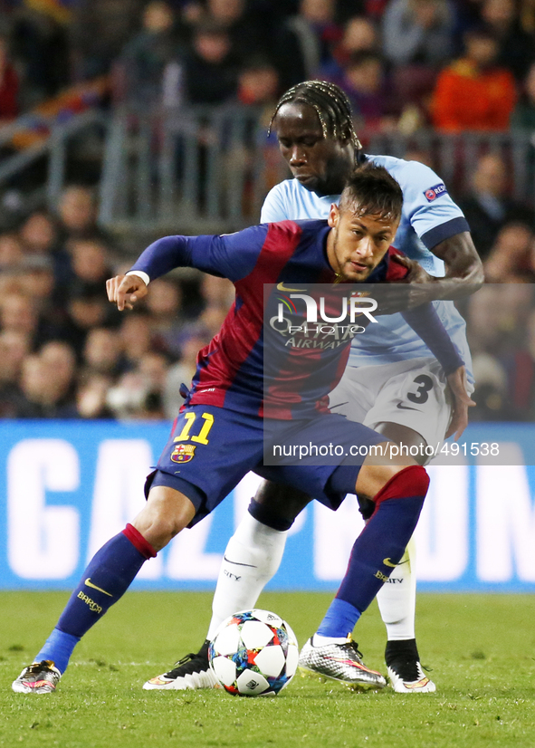 BARCELONA, SPAIN - MARCH 18: Neymar Jr. and Bacary Sagna  during the UEFA Champions League round of 16 match between FC Barcelona and Manche...