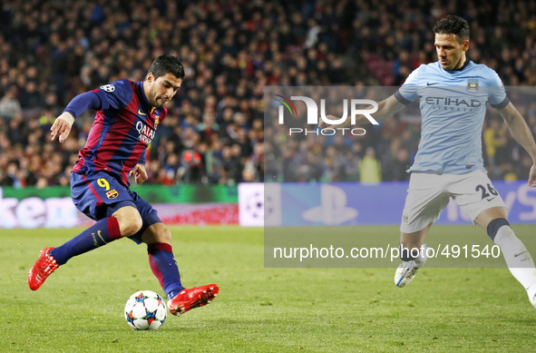 BARCELONA, SPAIN - MARCH 18: Luis Suarez and Martin Demichelis  during the UEFA Champions League round of 16 match between FC Barcelona and...