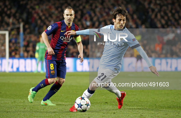 BARCELONA, SPAIN - MARCH 18: David Silva and Andres Iniesta during the UEFA Champions League round of 16 match between FC Barcelona and Manc...
