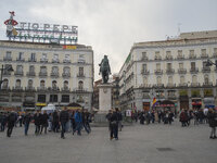 The Puerta del Sol is a place of Madrid (Spain) on March 19, 2015. Here is the Kilometer Zero Spanish radial roads. The oldest building is t...