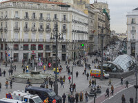 The Puerta del Sol is a place of Madrid (Spain) on March 19, 2015. Here is the Kilometer Zero Spanish radial roads. The oldest building is t...