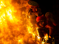 Fallas festival is celebrated by the people in Valencia, Spain on March 19, 2015. Many wooden monuments and figures were made for the festiv...