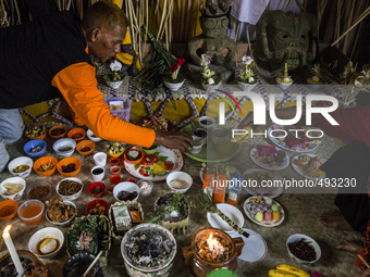 Indigenous Mah Meri man prepare before perform a ritual of the Hari Moyang (Ancestors Day) celebration at Sungai Bumbon village, Pulau Carey...