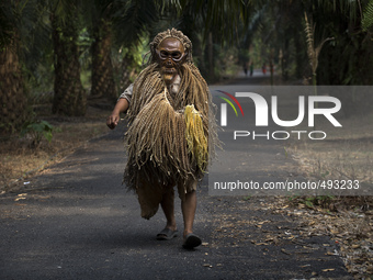 Indigenous Mah Meri dancer arrived in traditional costume with dance mask 'Bajus' for Hari Moyang (Ancestors Day) celebration at Sungai Bumb...
