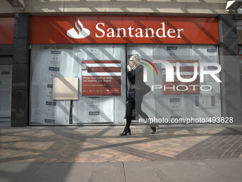 A former fashion store retail unit changing in to a branch of the Santander bank in central Stockport, on Wednesday 18th March 2015. -- A re...