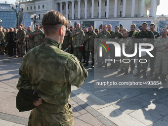 Commander has a speech in front of his soldiers during celebration. Ukraine marks the first anniversary of the first volunteering General Ku...