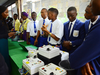School students presenting their Innovations to the Judges  during the National Company Of The Year 2019 Empower Nigerian Youths Through Inv...
