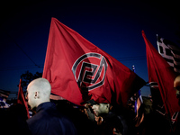 Youth of far-right political party of Golden Dawn outside its main offices, during a gathering against immigrants in Athens, March 21, 2015....