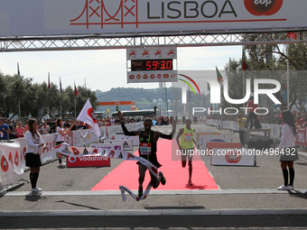 The british Mo Farah crossing the finish line and fall down in the Lisbon Half-Marathon 2015 on the 22th of March, 2015, in 59 minutes and 3...