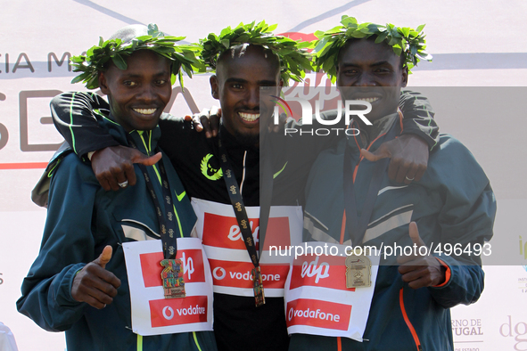 Podium of the Lisbon Half- Marathon: The british Mo Farah (c ) 1st, with the Kenyan Micah Kogo (L) 2nd, and the Kenyan Stephen Kibet (R ) 3t...