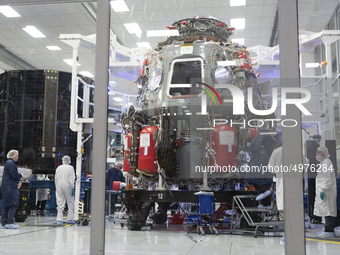 Workers are working in Crew Dragon cleanroom at SpaceX Headquarters in Hawthorne, California on October 10, 2019. (