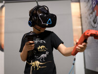 A kid plays in a VR Games arcade in Tel-Aviv, Israel on August 13, 2019.  (