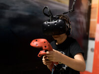 A kid plays in a VR Games arcade in Tel-Aviv, Israel on August 13, 2019.  (
