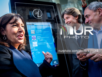 Mayor of Paris Anne Hidalgo (L) and Jean-Charles Decaux, chairman of the board and co-CEO of multinational advertising corporation JCDecaux,...