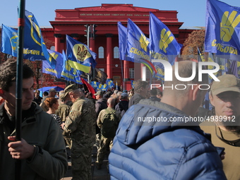 Ukrainians participate a march under the flags of far-right Svoboda party marking 77th anniversary of Ukrainian Insurgent Army (UPA) in down...