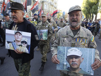 Ukrainian veterans, participants of the conflict between the Ukrainian government forces and pro-Russian separatists in eastern regions, car...