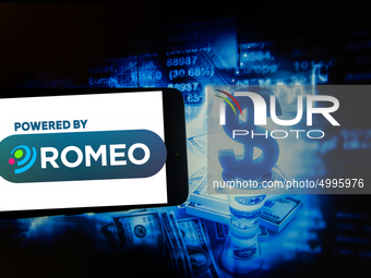 In this photo illustration taken in New York, US, on 15 October 2019 show the logo of the gay dating app Romeo is seen on a screen next to a...