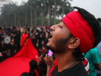Bangladeshi social activist of Lal Jatra made a rally with street performance act and song to remember the genocide of Bangladeshi people wh...