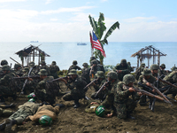  Japanese soldiers played by Talisay City College students take cover from the huge explosion during the Landing Reenactment at Talisay City...