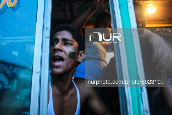 A boy is roaring in a bus on the occasion of independence day at Dhaka, Bangladesh, March 26, 2015. 