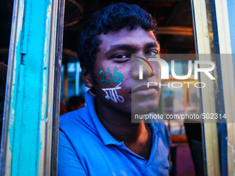 A boy is roaring in a bus on the occasion of independence day at Dhaka, Bangladesh, March 26, 2015. (