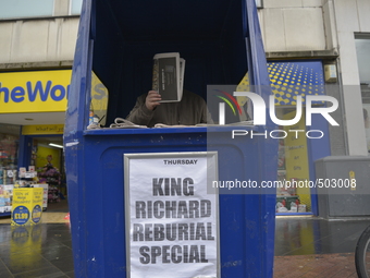 A man selling souvenier newspapers in Leicester city centre for King Richard III's Service of reinternment on Thursday 26th March 2015. --...