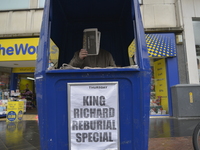 A man selling souvenier newspapers in Leicester city centre for King Richard III's Service of reinternment on Thursday 26th March 2015. --...