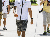 British F1 driver Lewis Hamilton of  Mercedes AMG Petronas F1 Team walks at paddock area during the Malaysian Formula One Grand Prix at Sepa...