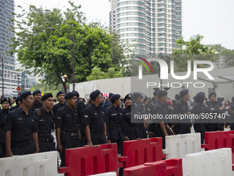 The police have set up a barricade across Jalan Ampang, just before the Public Bank building at the Jalan Ampang-Jalan P. Ramlee-Jalan Yap K...