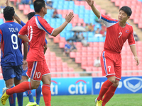 Jo Kwang of DPR Korea (R) celebrates with teammate after scoring during the AFC U-23 Championship 2016 qualifiers round at Rajamangala Stadi...