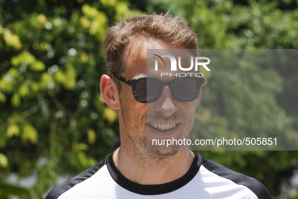 British Jenson Button of McLaren Honda walks at paddock area during the Malaysian Formula One Grand Prix at Sepang International Circuit (SI...