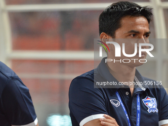 Thailand Coach Kiatisuk Senamuang looks on during the AFC U-23 Championship 2016 qualifiers round between Thailand and Phillipines at Rajama...