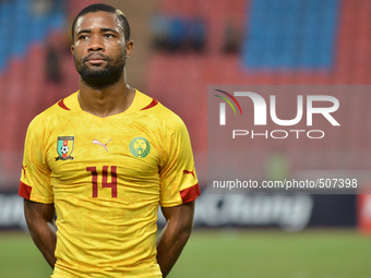 Aurelien Chedjou of Cameroon lines up ahead of the international friendly match between Thailand and Cemeroon at Rajamangala Stadium in Bang...