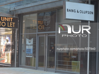 Light shining on a closed retail unit on Monday 30th March 2015. (