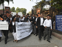 Lawyers march towards India Gate from the Supreme Court premises as they protest against Delhi Police on 4 November 2019 in New Delhi, India...