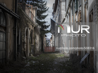 A abandoned street near the 'red zone' closed to public, in the historic area of L'Aquila, on March 31, 2015. The sixth anniversary of the L...