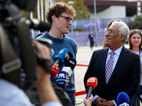 Portugal's Prime Minister Antonio Costa (R ) chats with Web Summit's Irish chief executive officer Paddy Cosgrave during the annual Web Summ...